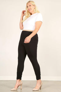 Fitted Leggings With An Elastic Waistband And Ruched Pants